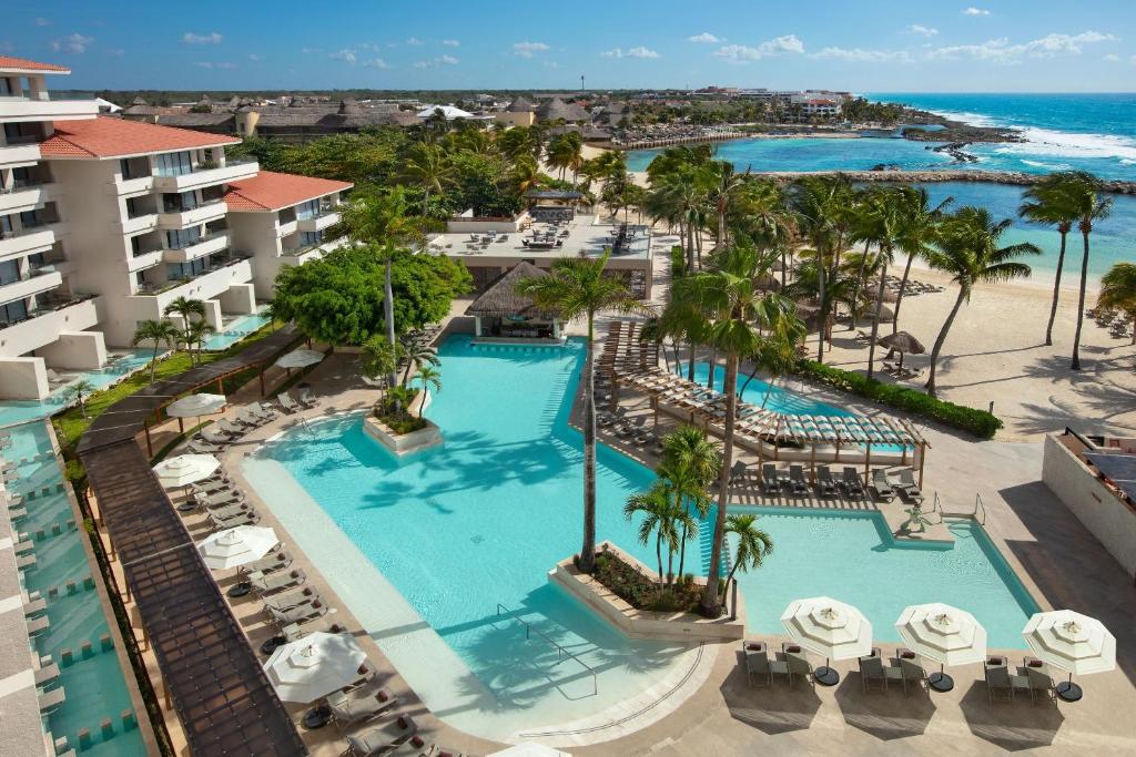 an aerial view of the pool at the resort at Dreams Aventuras Riviera Maya - All Inclusive in Puerto Aventuras