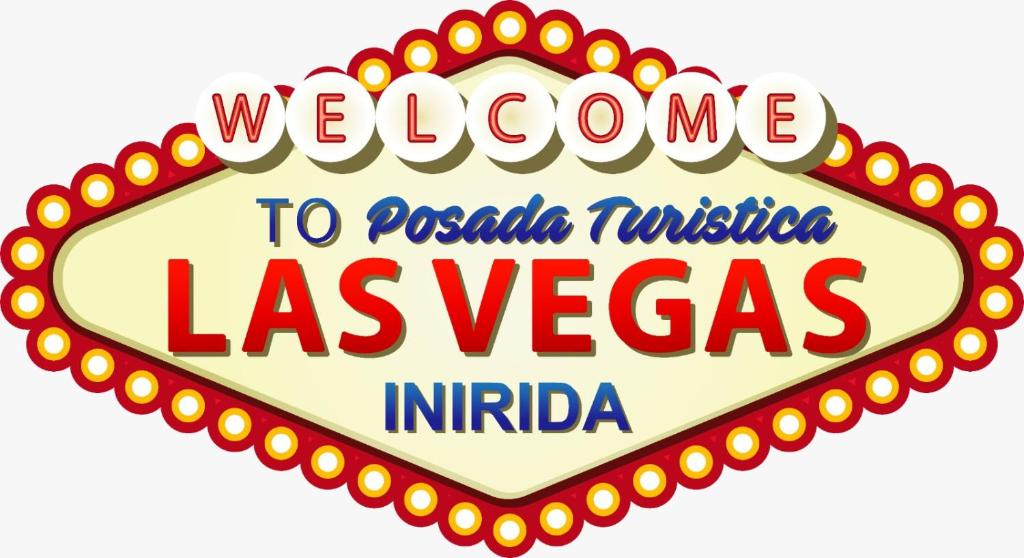 Una señal de bienvenida a Las Vegas con luces en POSADA TURISTICA LAS VEGAS en Puerto Inírida