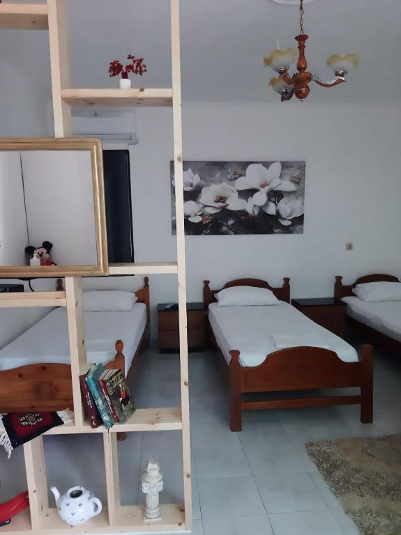 Postel nebo postele na pokoji v ubytování Vrenjo GuestHouse