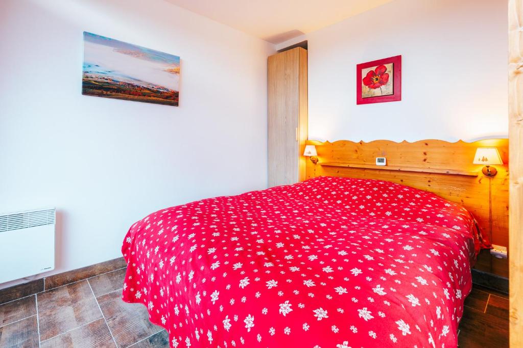 Łóżko lub łóżka w pokoju w obiekcie Mystic Mountain Apartment Chamrousse