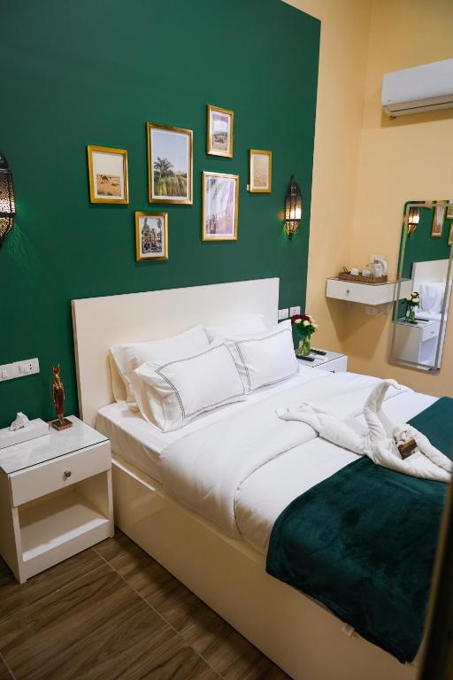 Postel nebo postele na pokoji v ubytování Hathor House