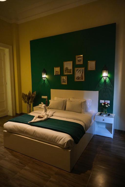 Postel nebo postele na pokoji v ubytování Hathor House