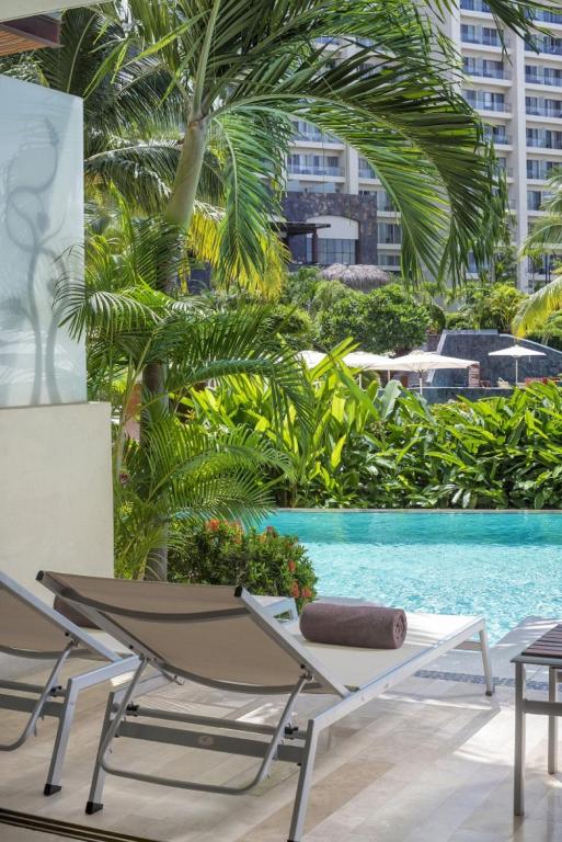 Bazén v ubytování Dreams Vallarta Bay Resorts & Spa - All Inclusive nebo v jeho okolí