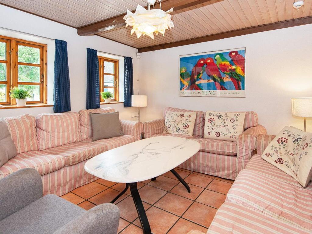 Posezení v ubytování 14 person holiday home in Ørsted-By Traum
