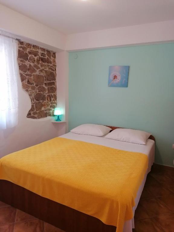 Posteľ alebo postele v izbe v ubytovaní Apartments by the sea Kukljica, Ugljan - 8209