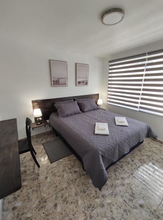 "Apartamento Blanco" en Centro de Baños tesisinde bir odada yatak veya yataklar
