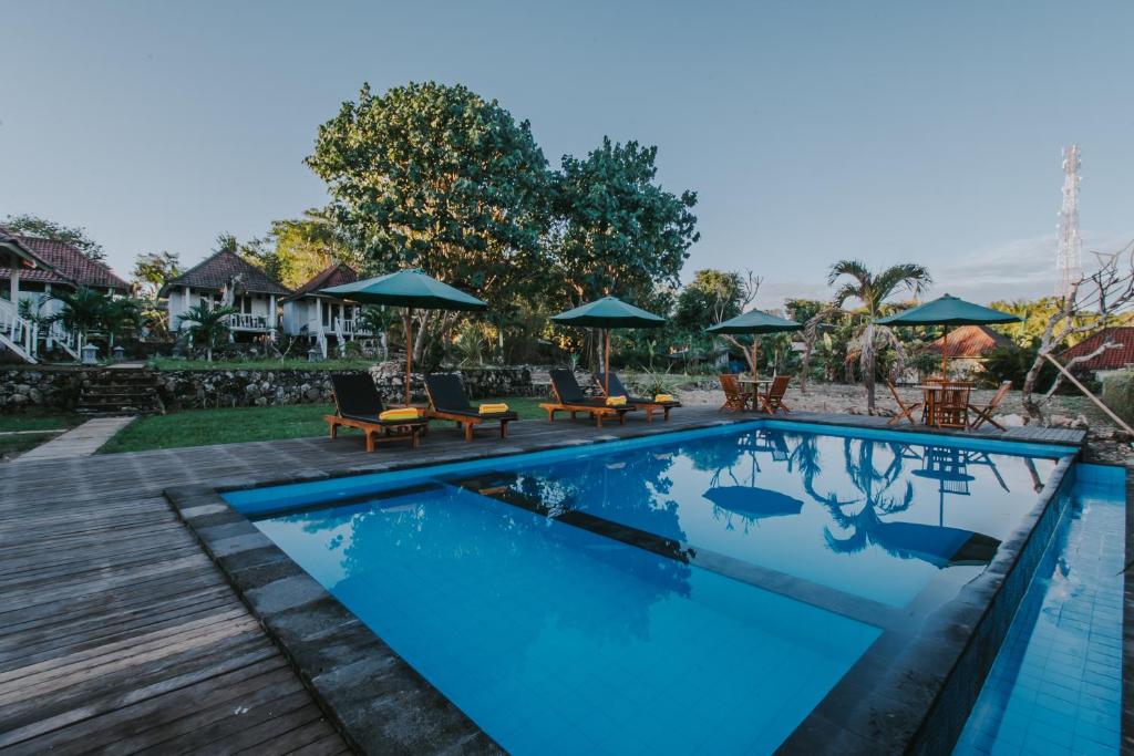 Bazén v ubytování Paluh Beach Huts nebo v jeho okolí