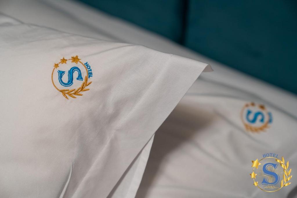 Postel nebo postele na pokoji v ubytování Sofia Hotel