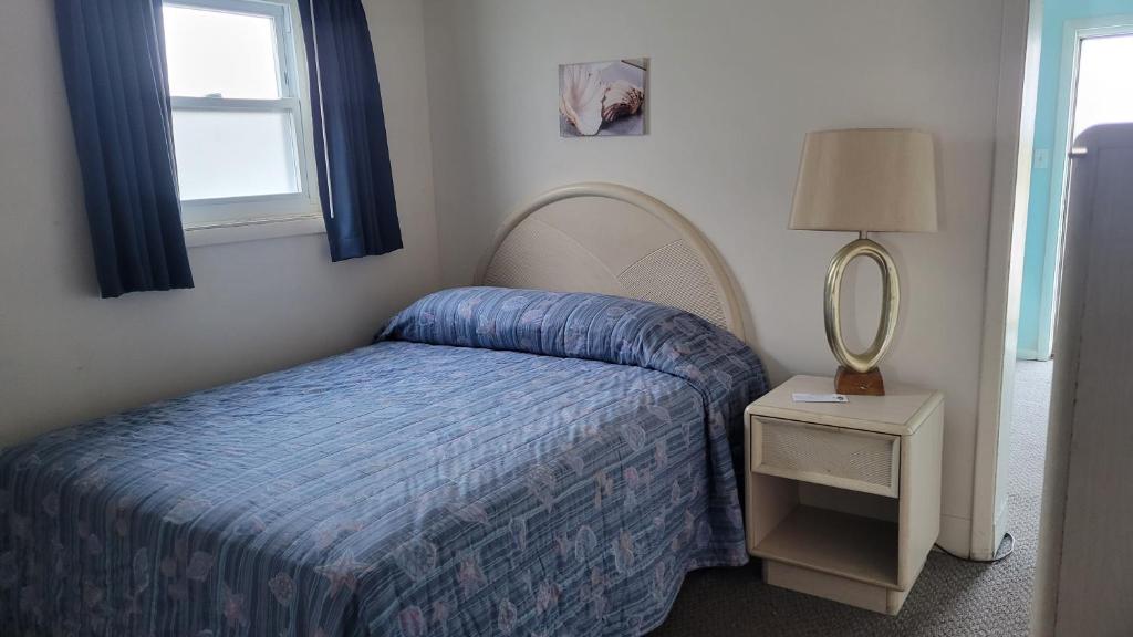 Postel nebo postele na pokoji v ubytování Conca D'or Motel