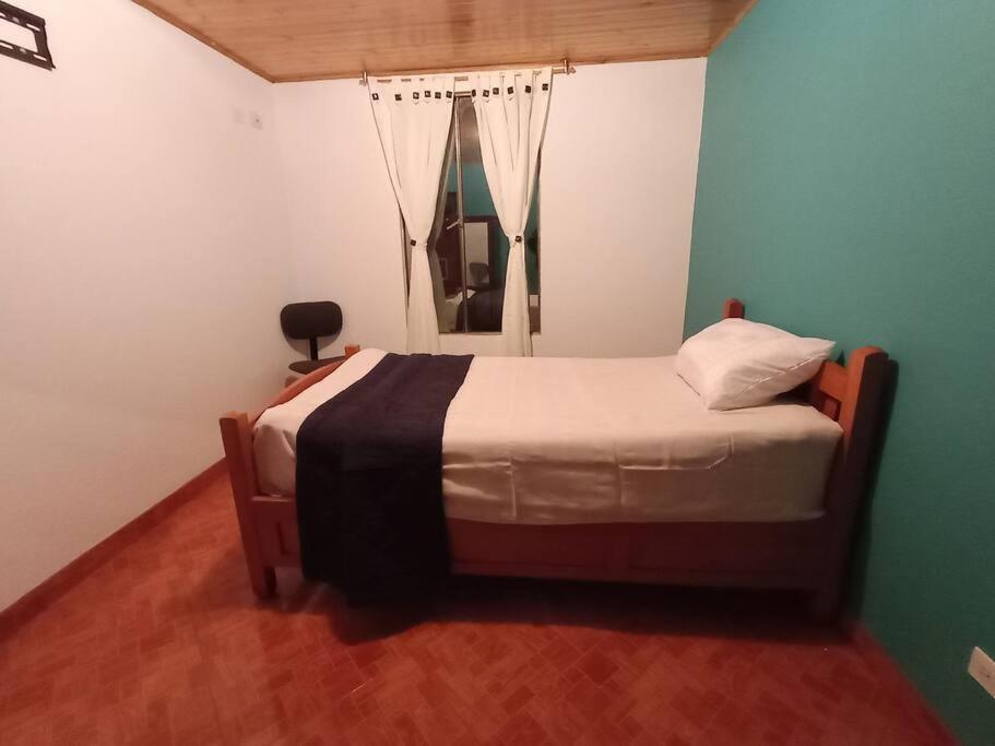 Postel nebo postele na pokoji v ubytování Guaxique