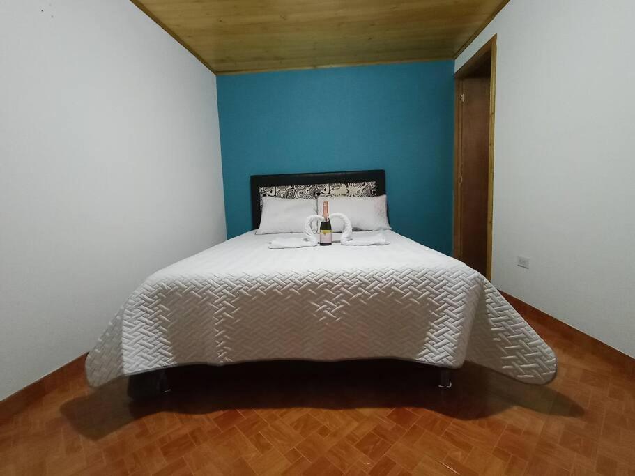 Postel nebo postele na pokoji v ubytování Guaxique