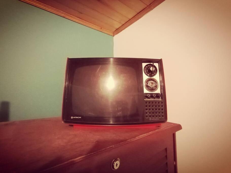 TV a/nebo společenská místnost v ubytování Guaxique