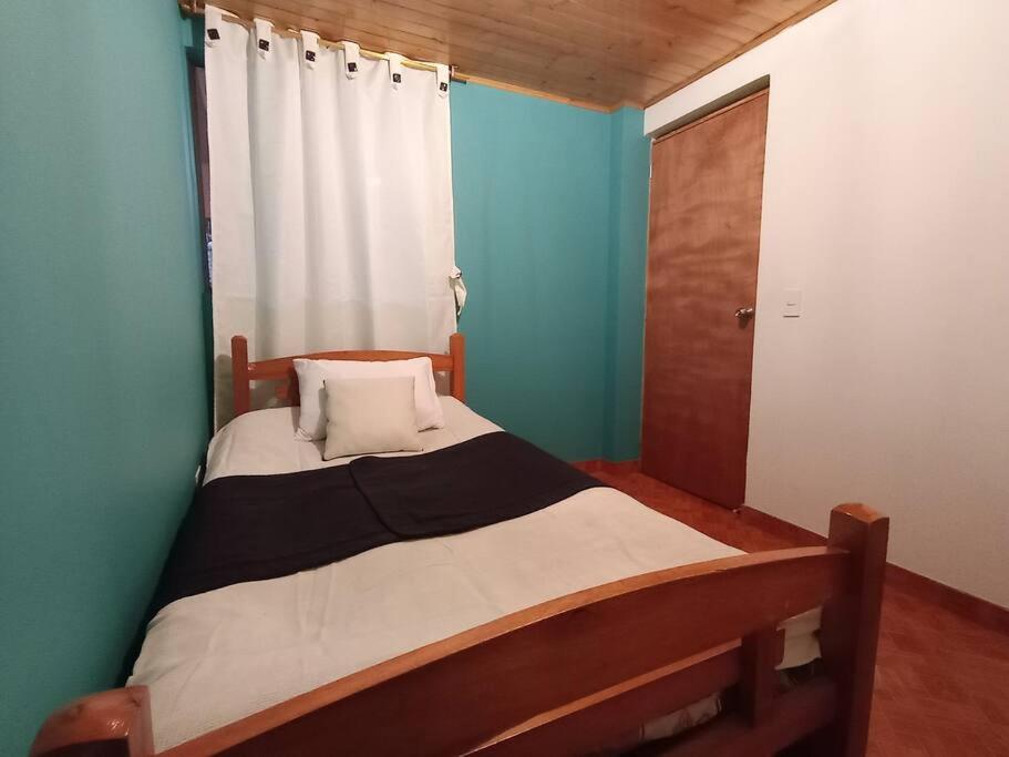 Postel nebo postele na pokoji v ubytování Guaxique