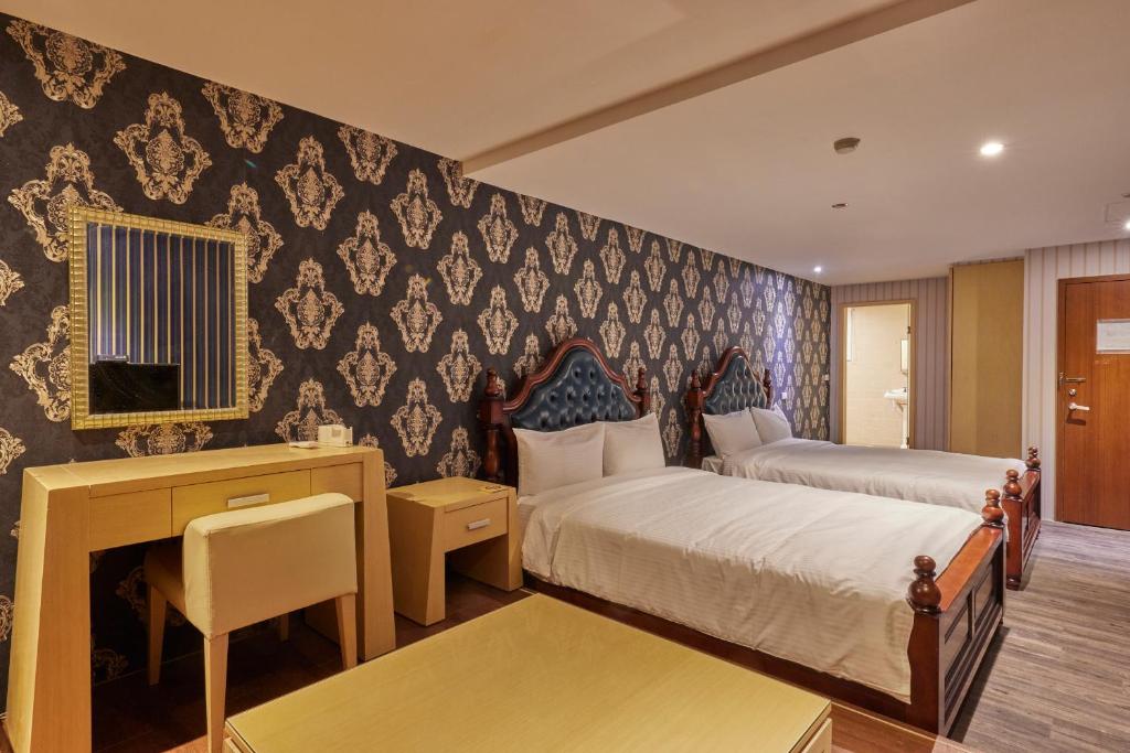 Postel nebo postele na pokoji v ubytování Kyokusui Hotspring Hotel