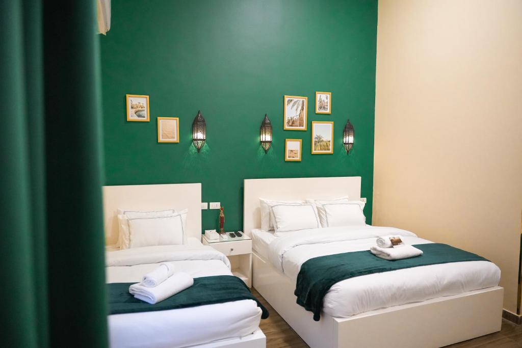 Postel nebo postele na pokoji v ubytování Hathor House