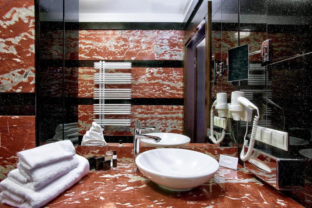 Kúpeľňa v ubytovaní BoutiqueHotel Aristo