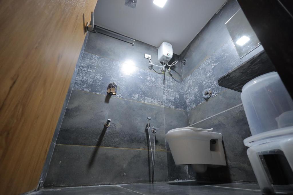 Koupelna v ubytování HOTEL RK FORTUNE