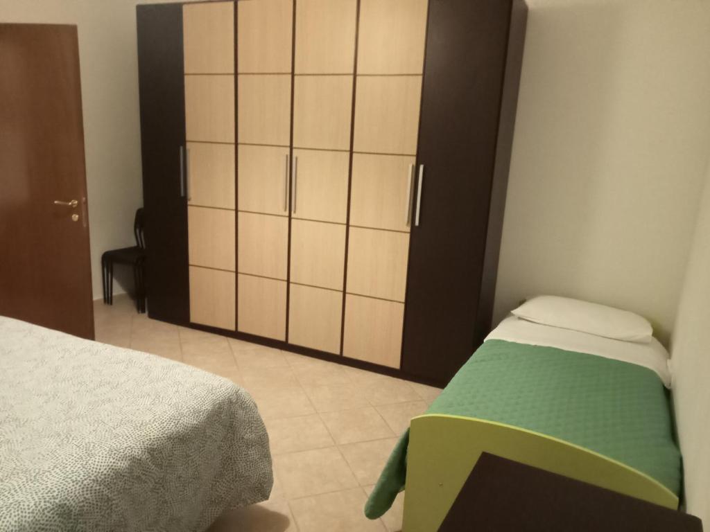 Łóżko lub łóżka w pokoju w obiekcie Casa Cencioni
