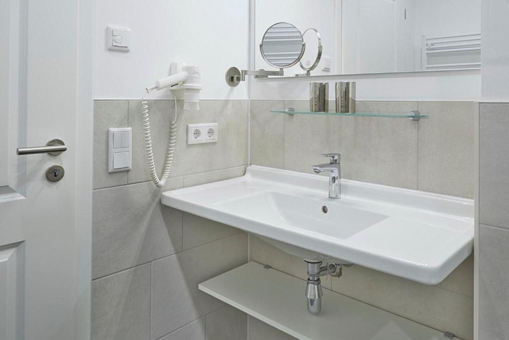 Koupelna v ubytování Aparthotel Waterkant Suites - Fewos am Meer mit SPA