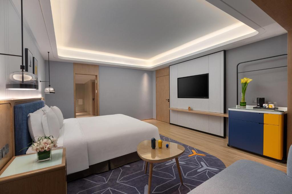 TV a/nebo společenská místnost v ubytování voco Guangzhou Shifu by IHG