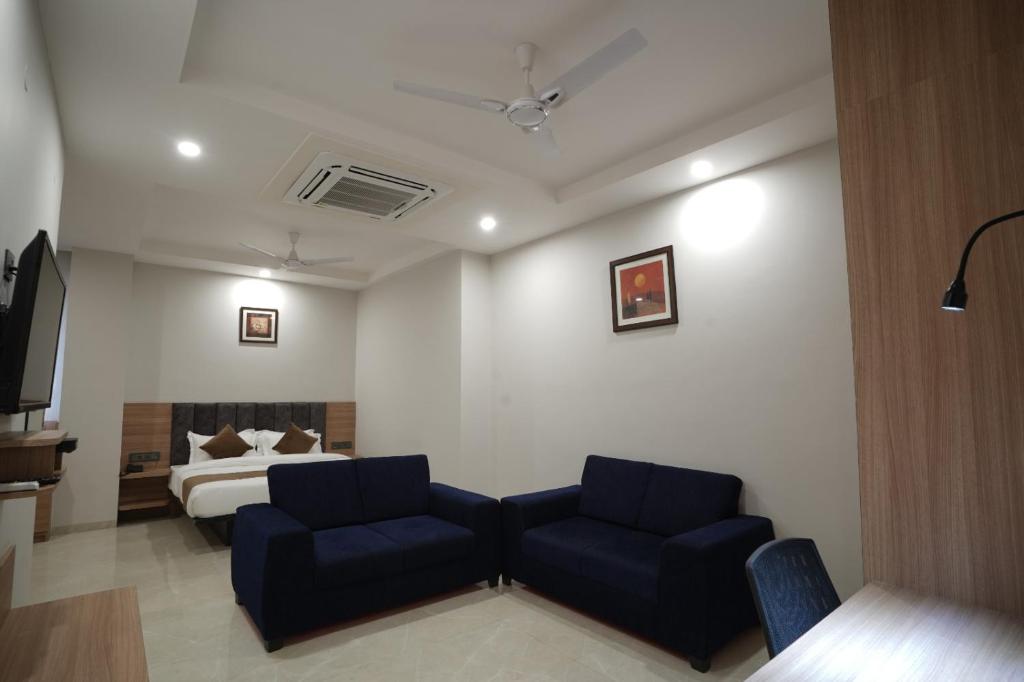 Posezení v ubytování Hotel Krishna Inn