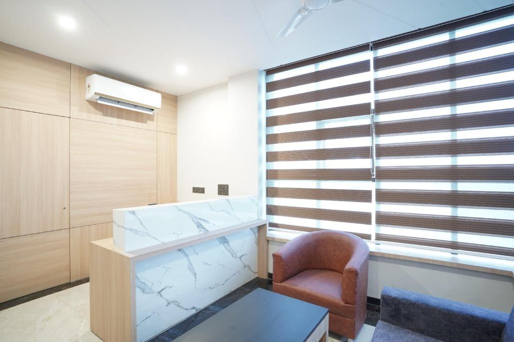 Posezení v ubytování Hotel Krishna Inn