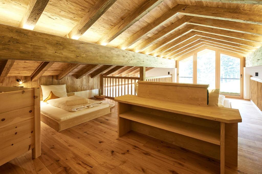 Voodi või voodid majutusasutuse Almchalet Weberhof toas