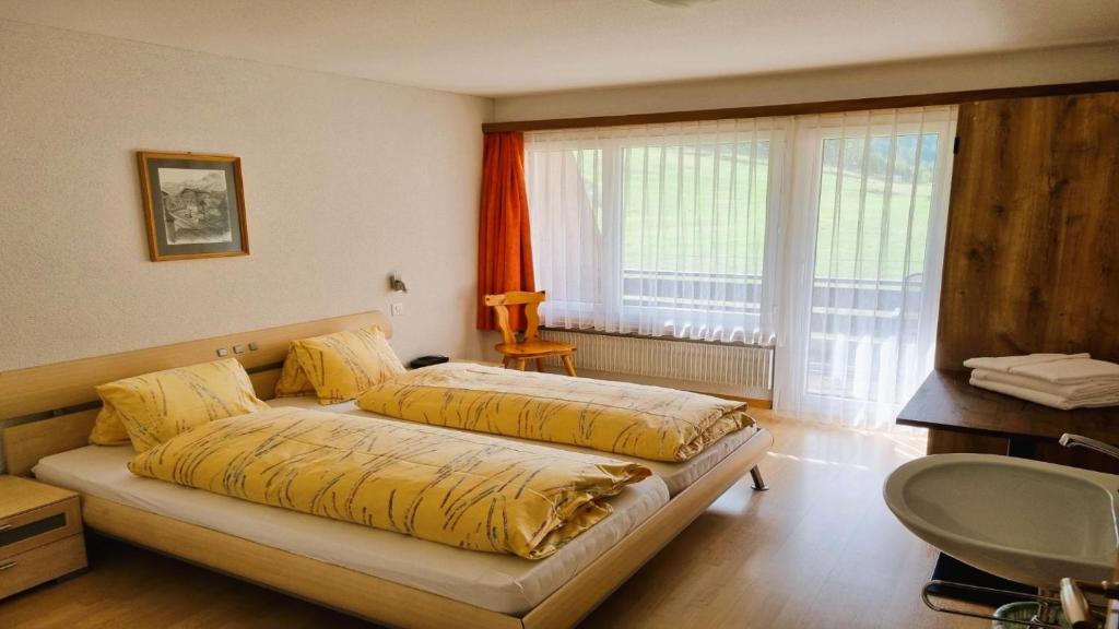 Postel nebo postele na pokoji v ubytování Apartments Atlas