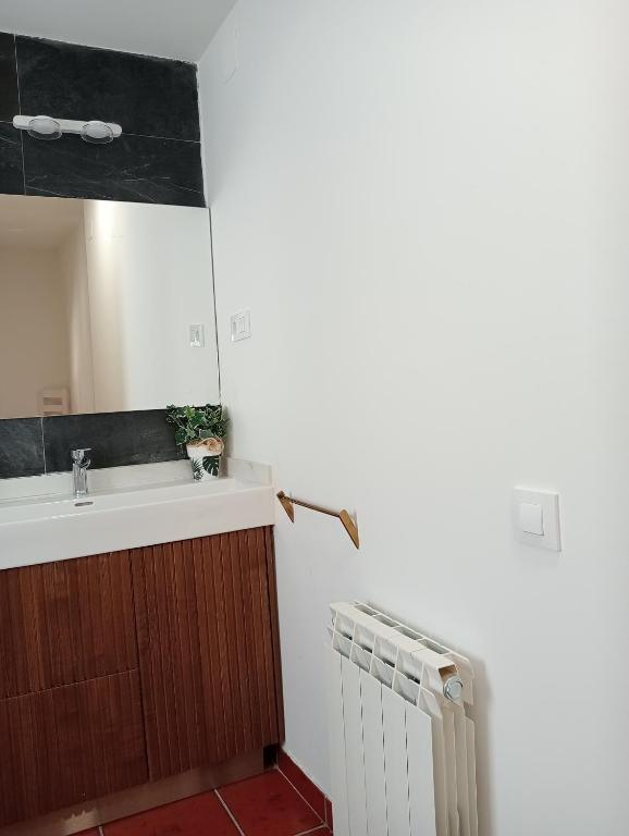 Kuchyňa alebo kuchynka v ubytovaní Apartamentos La Piedra en pleno centro histórico con dos dormitorios y dos baños
