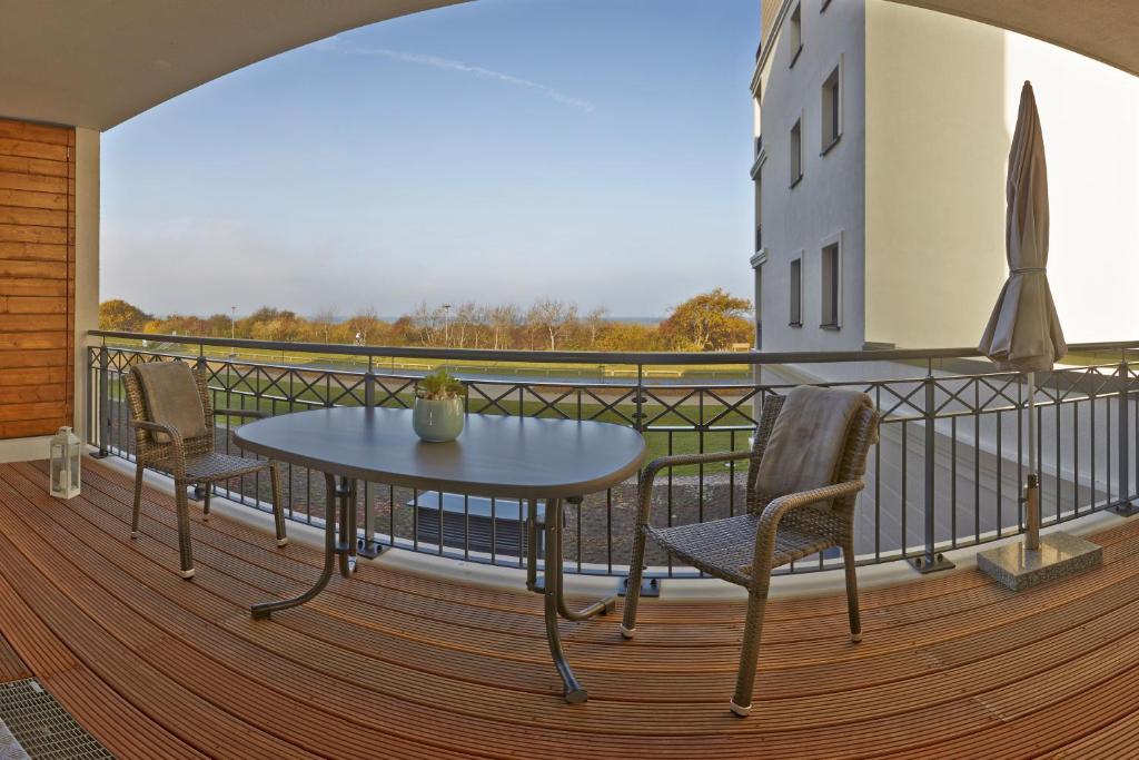 Balkón nebo terasa v ubytování Aparthotel Waterkant Suites - Fewos am Meer mit SPA
