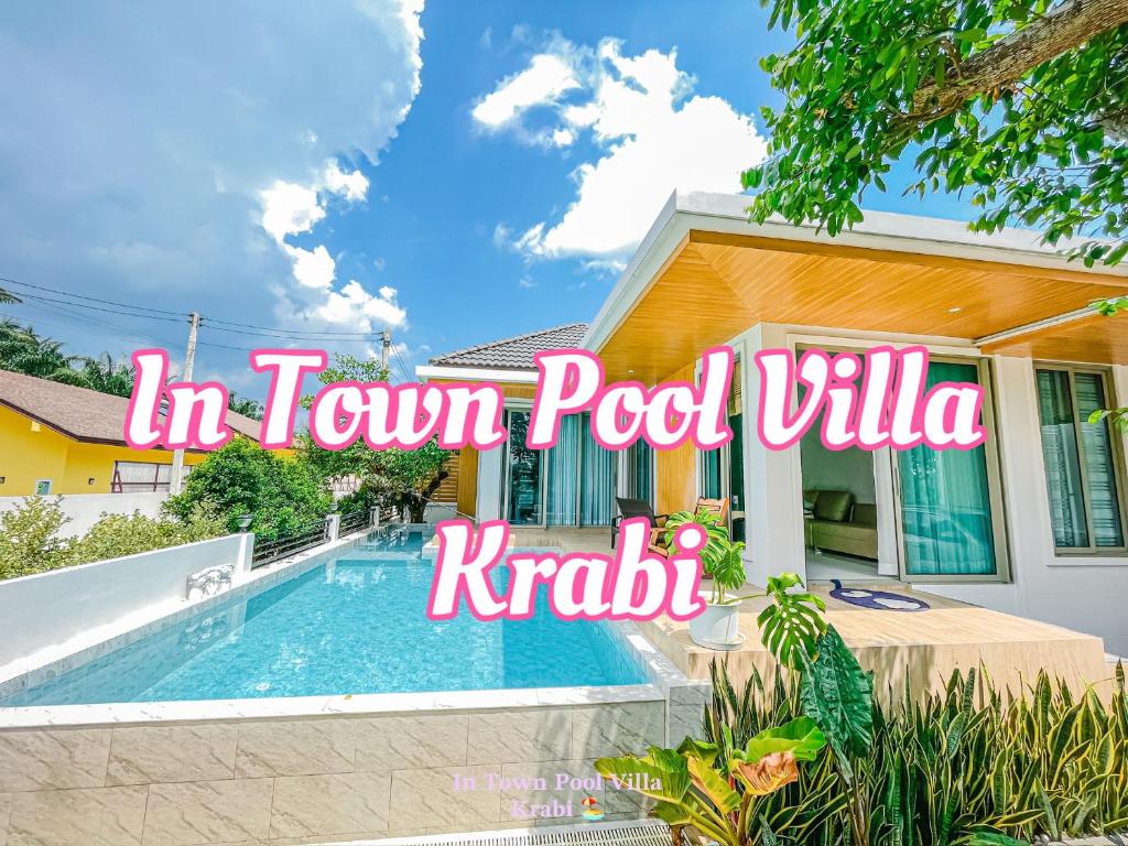 a house with a swimming pool in front of it at In Town Pool Villa Krabi in Ban Khlong Chi Lat