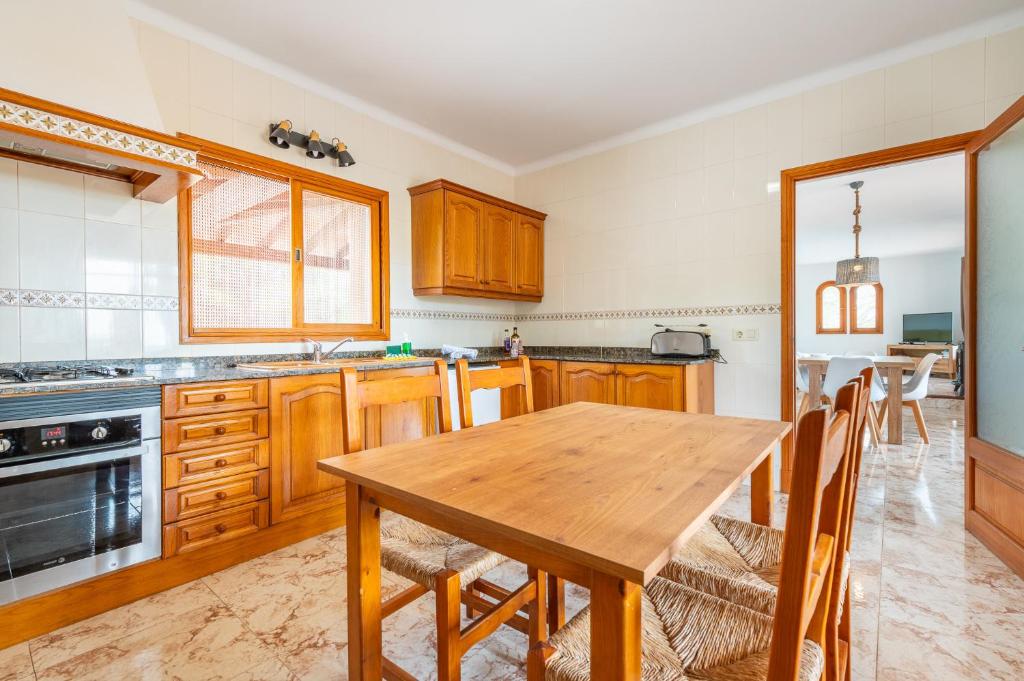 A kitchen or kitchenette at Finca Bosc de Can Alou by Mallorca House Rent