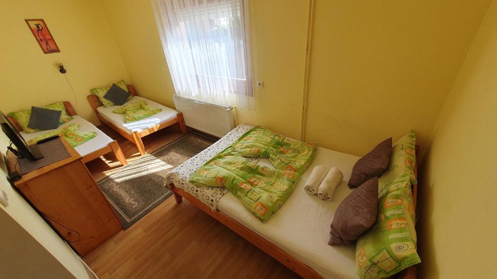 Postel nebo postele na pokoji v ubytování Ati&Hanna