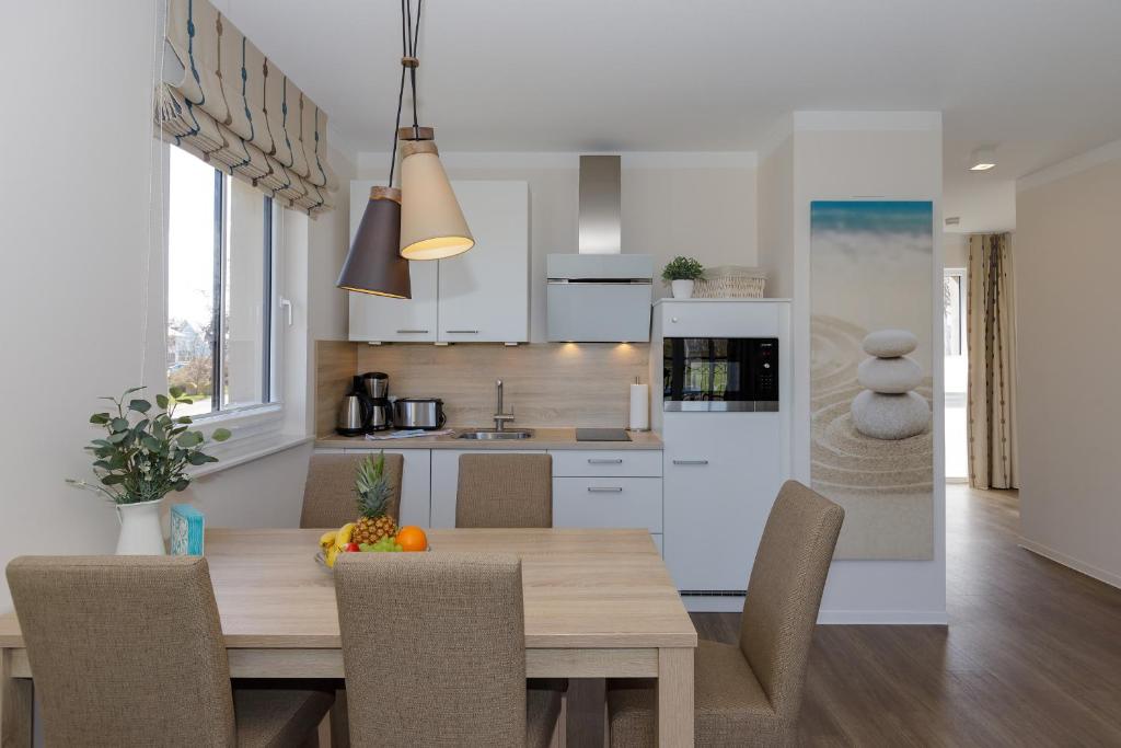 Kuchyň nebo kuchyňský kout v ubytování Aparthotel Waterkant Suites - Fewos am Meer mit SPA