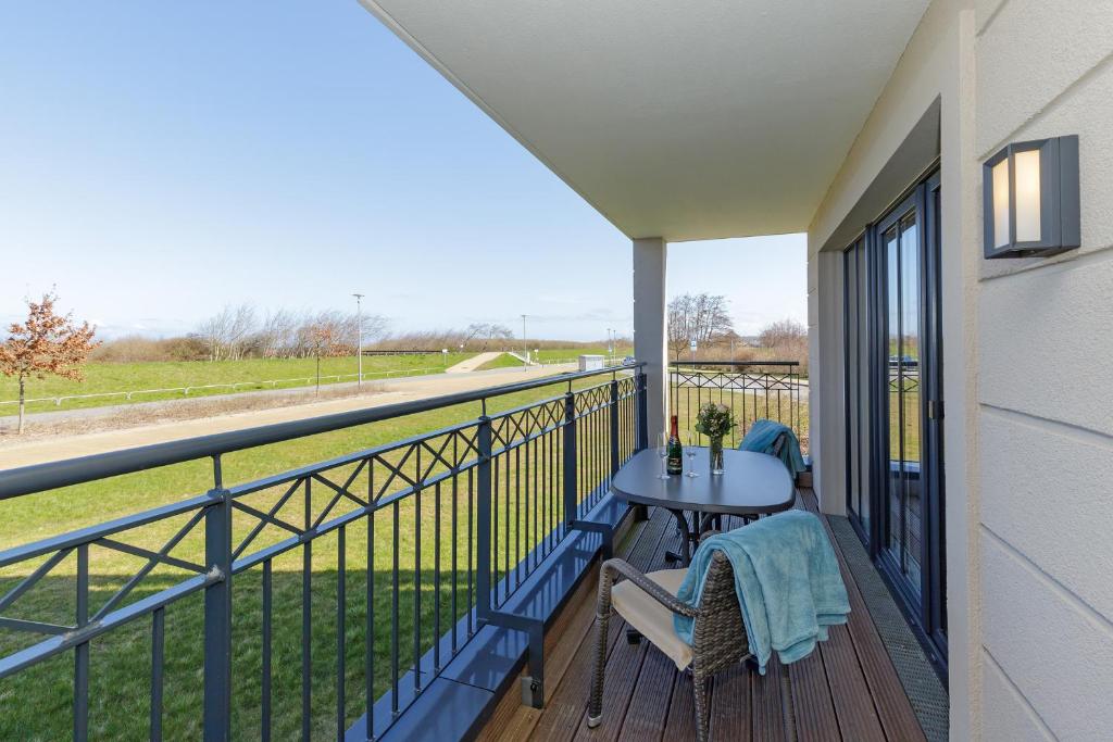 Balkón nebo terasa v ubytování Aparthotel Waterkant Suites - Fewos am Meer mit SPA