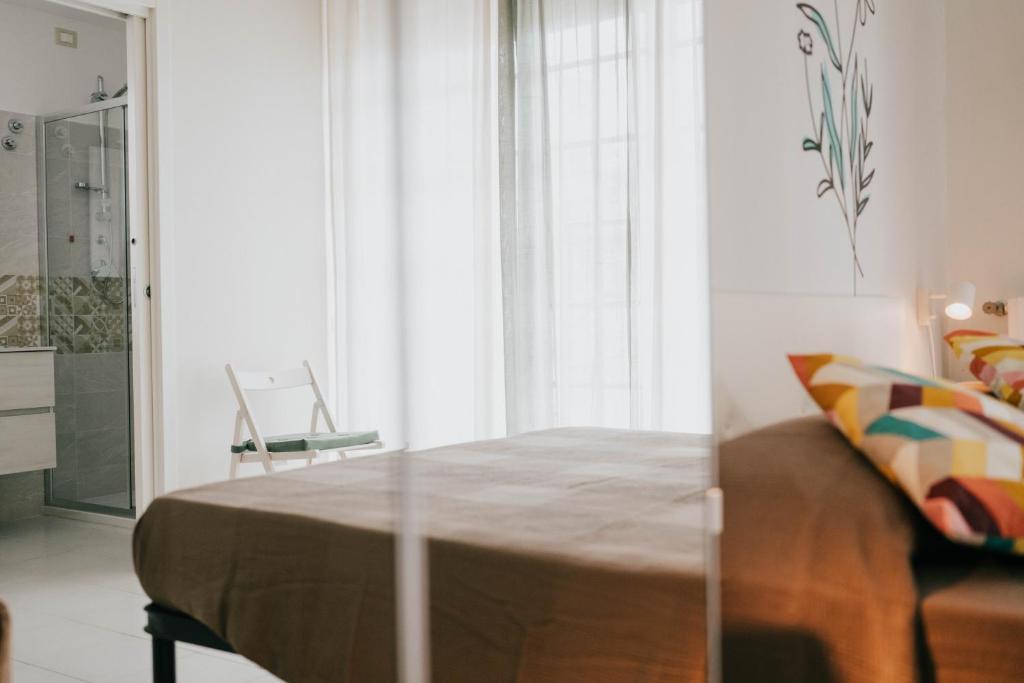 Postel nebo postele na pokoji v ubytování MAF B&B