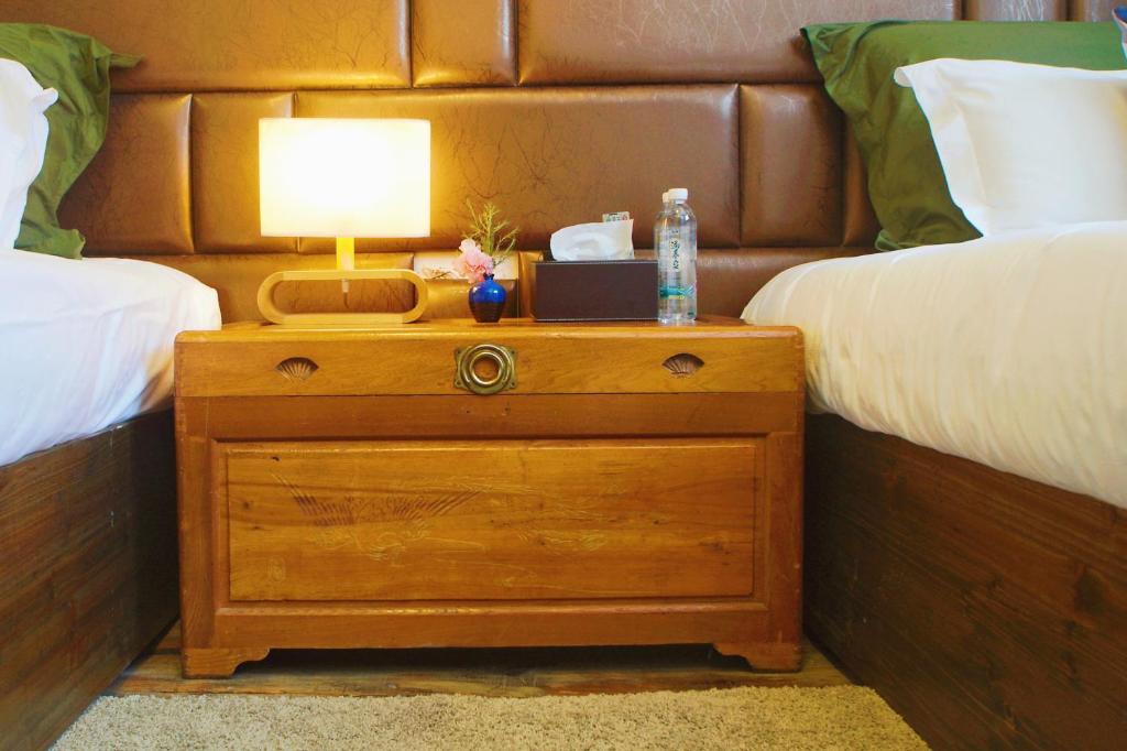 Postel nebo postele na pokoji v ubytování Alina Garden Boutique Resort Huangshan Hongcun