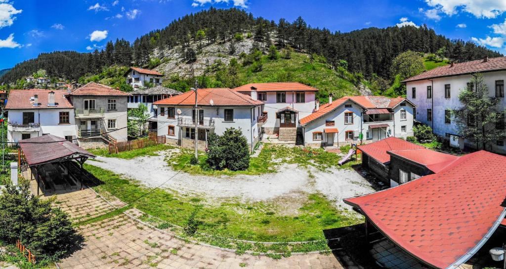 an aerial view of a village with houses at Комплекс Петлето in Smolyan
