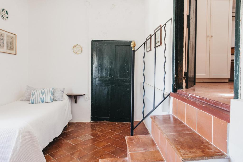 A bed or beds in a room at Agroturismo Son Triay