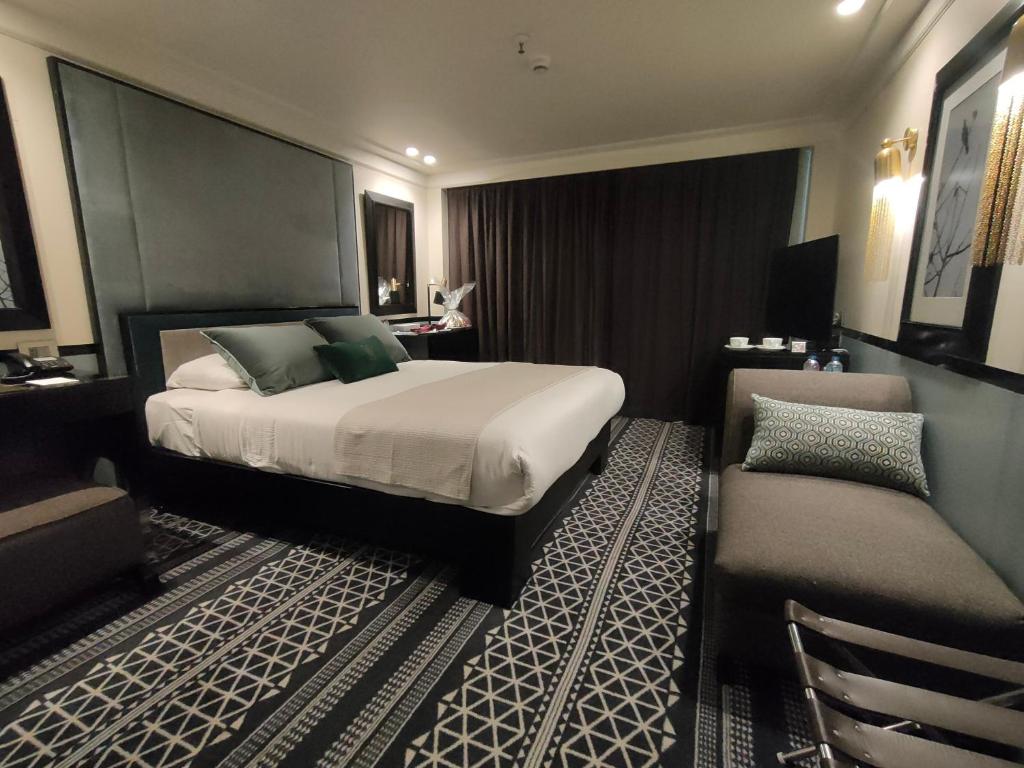 Postel nebo postele na pokoji v ubytování Movenpick MS Hamees