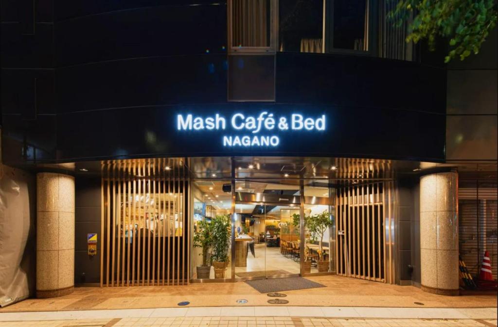 a mashica coffee and bed restaurant in a building at Mash Cafe & Bed NAGANO in Nagano