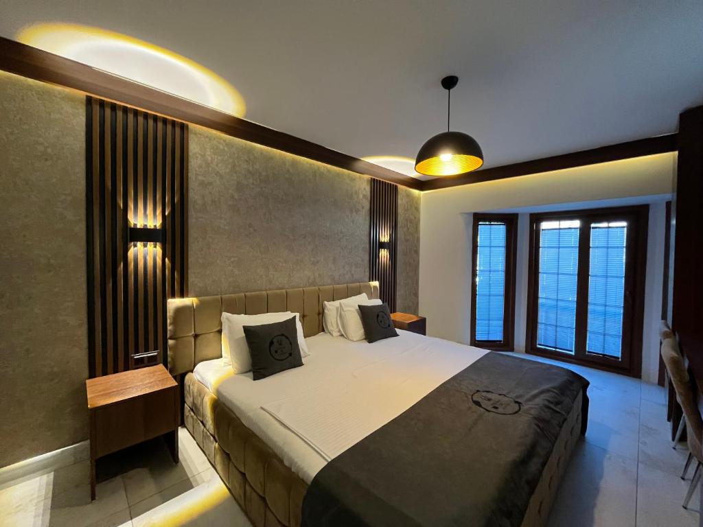 Postel nebo postele na pokoji v ubytování Villa Da Otel