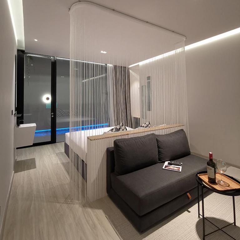 Posezení v ubytování INNLUXPHUKET
