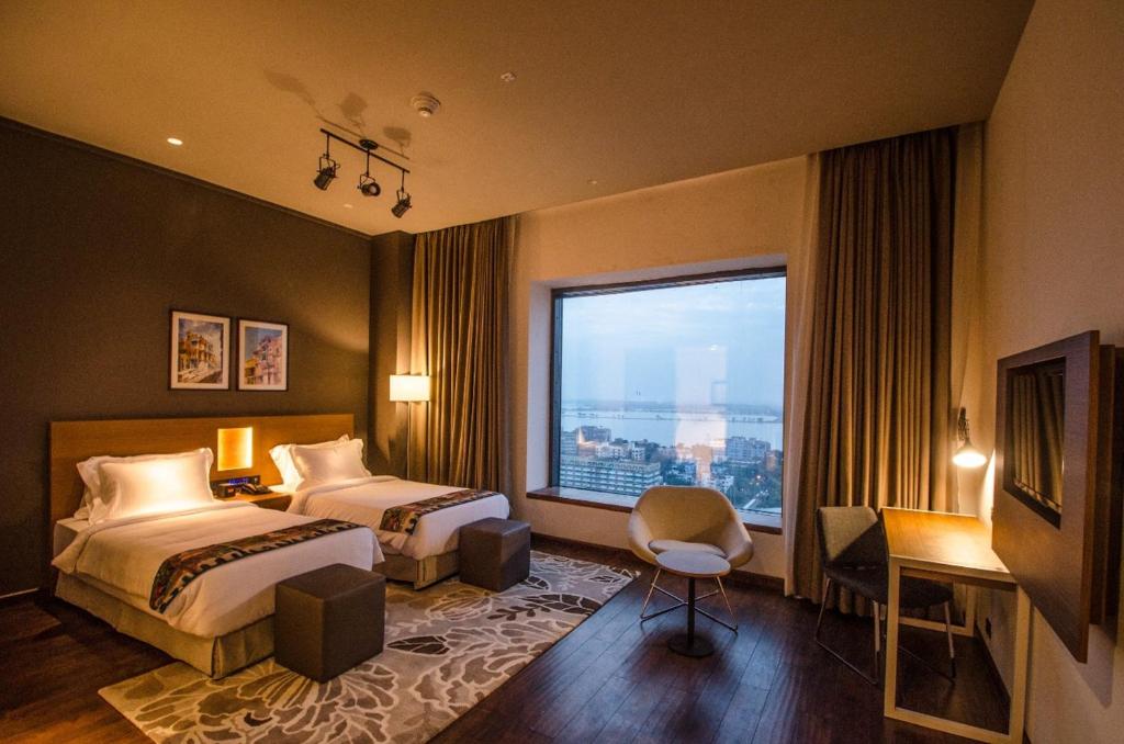 Postel nebo postele na pokoji v ubytování AltAir Boutique Hotel