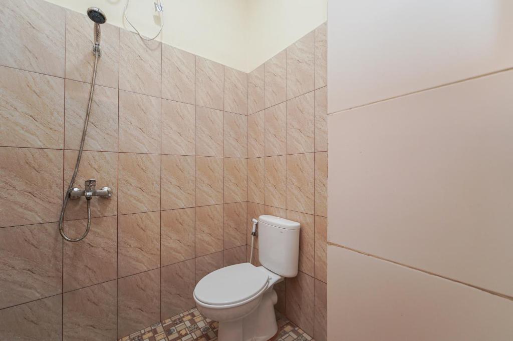 Koupelna v ubytování RedDoorz near Universitas YARSI