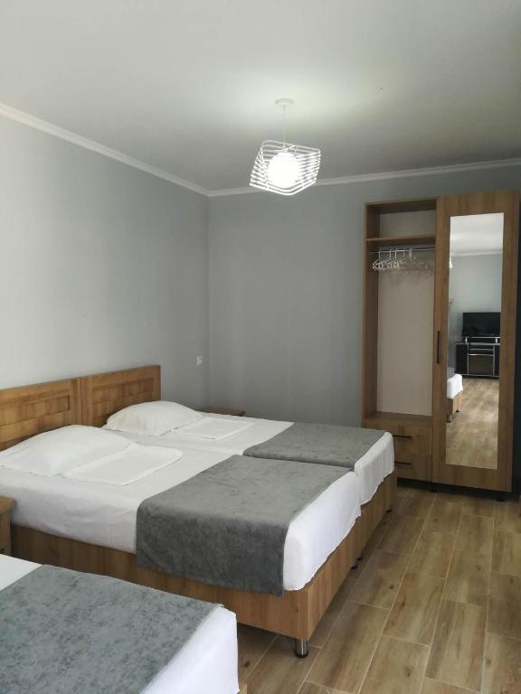 Postel nebo postele na pokoji v ubytování жули