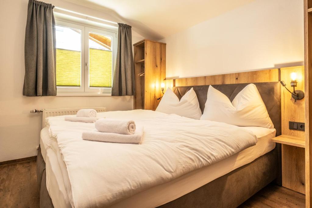 Postel nebo postele na pokoji v ubytování Alpha Apartments