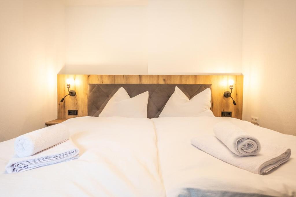 Postel nebo postele na pokoji v ubytování Alpha Apartments