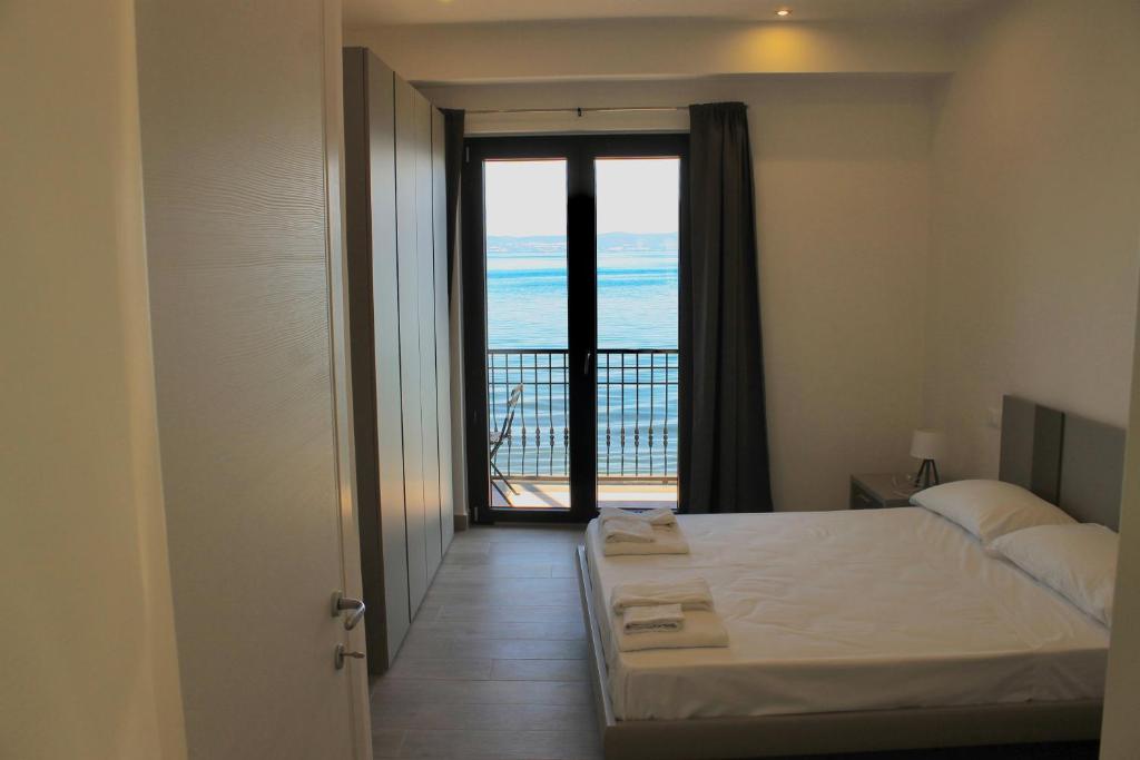 Ένα ή περισσότερα κρεβάτια σε δωμάτιο στο Like Lake Martana