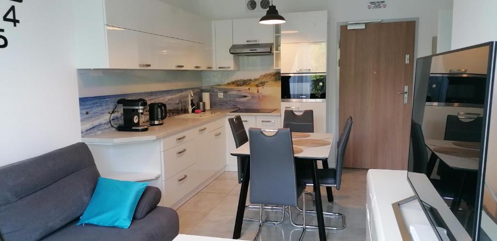 Kuchyňa alebo kuchynka v ubytovaní Apartamenty Mariela-Kołobrzeg z garażem